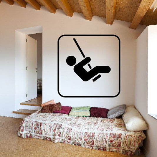 Tree swing sign decal with black wheelchair-accessibility icon in rounded square
