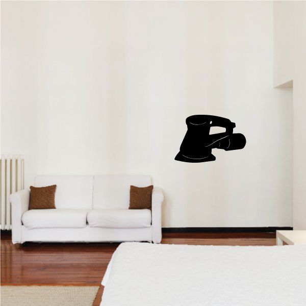 Triangle orbital sander decal, black triangular tool silhouette on wall