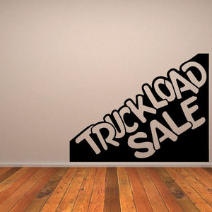 Vinyl wall decal with black shape and bold white stylized text