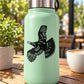 Black flying turkey silhouette decal sticker on a bottle
