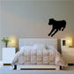 Rottweiler turning wall decal, black dog silhouette with tail and paws