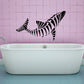 Turning skeleton dolphin wall decal, black graphic