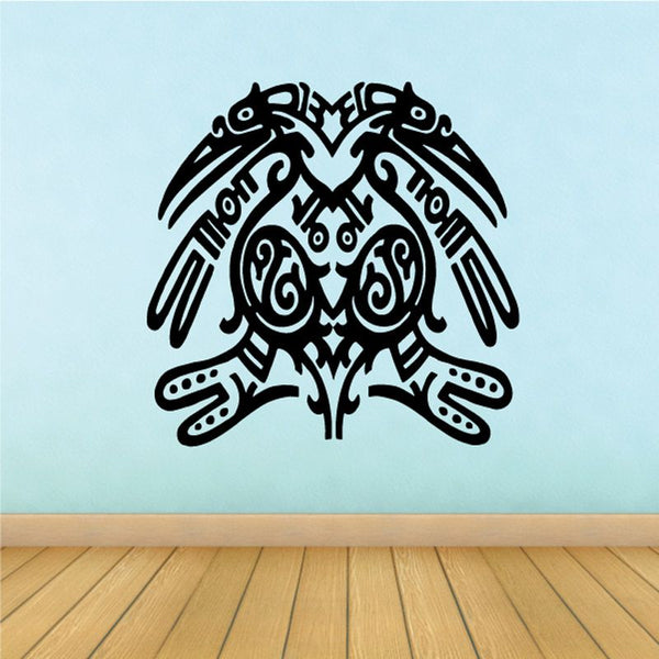 Tribal twin-headed bird decal, black ink style with ornate swirls and wings.