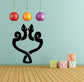 Black two-head snake twisting wall decal with two eye-like openings