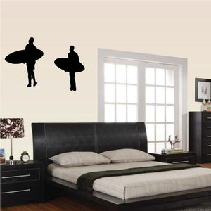 Two surfer wall decal silhouettes with surfboards in black