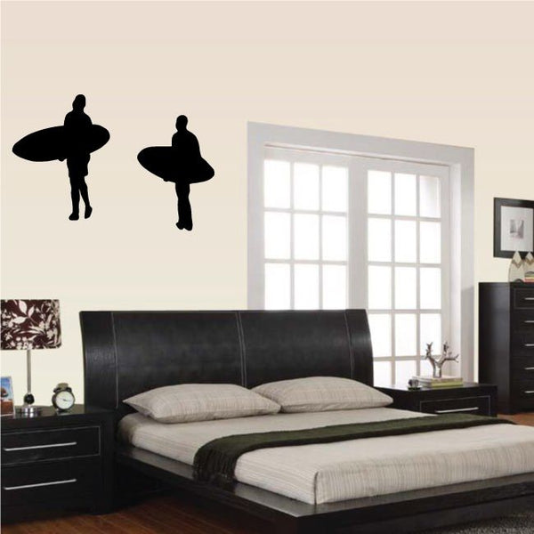 Two surfer wall decal silhouettes with surfboards in black