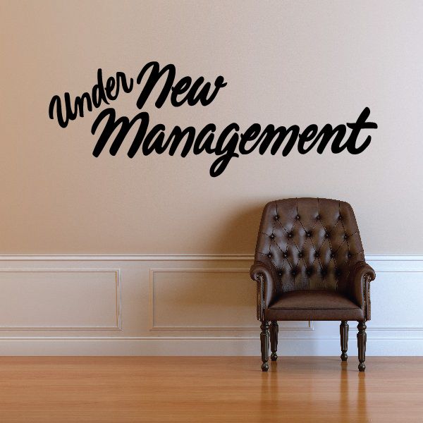 Under New Management wall decal in black cursive lettering