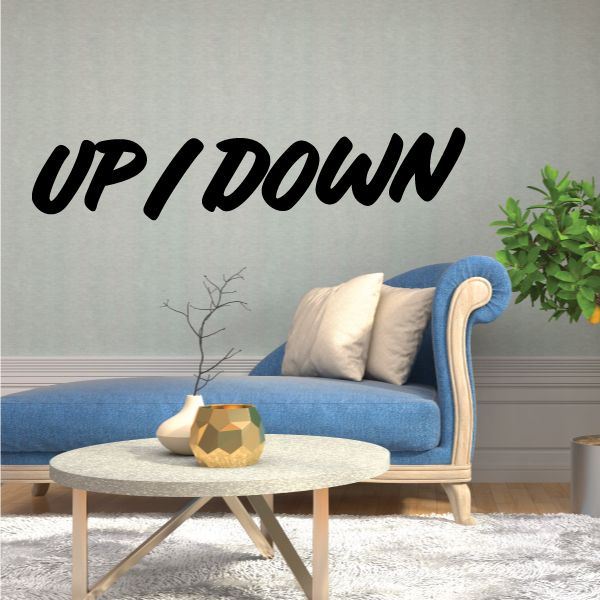 Wall decal with black UP/DOWN script lettering