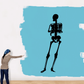 Upset skeleton wall decal silhouette, black outline with raised hand and bow tie.