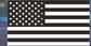 Black-and-white vinyl sticker of the USA flag with white stars and striped bands