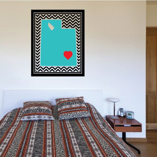 Square chevron sticker with black-and-white zigzag border and teal heart icon