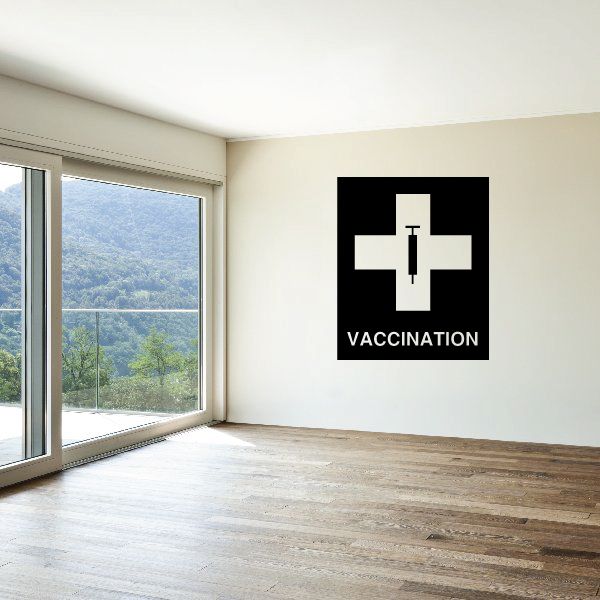 Vinyl wall decal with black cross and syringe icon, with 'Vaccination' text