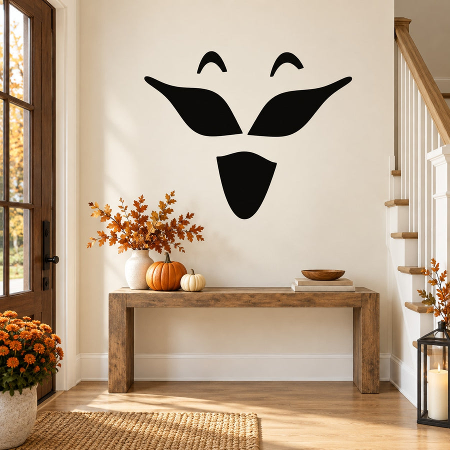 Black stylized face decal with arched brows, eyes, and heart-shaped lips