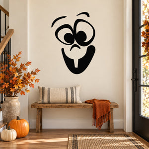 Black baby face decal with large eyes, circular cheeks, and stick tongue
