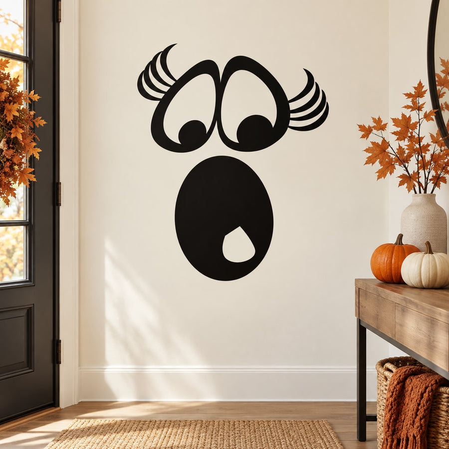 Scared eyes face decal with bold black wide eyes and curled hornlike lashes