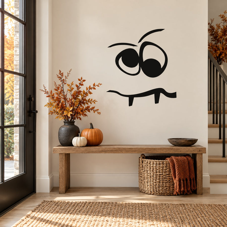 Black cartoon Goofy face decal with big eyes, nose, and smiling mouth