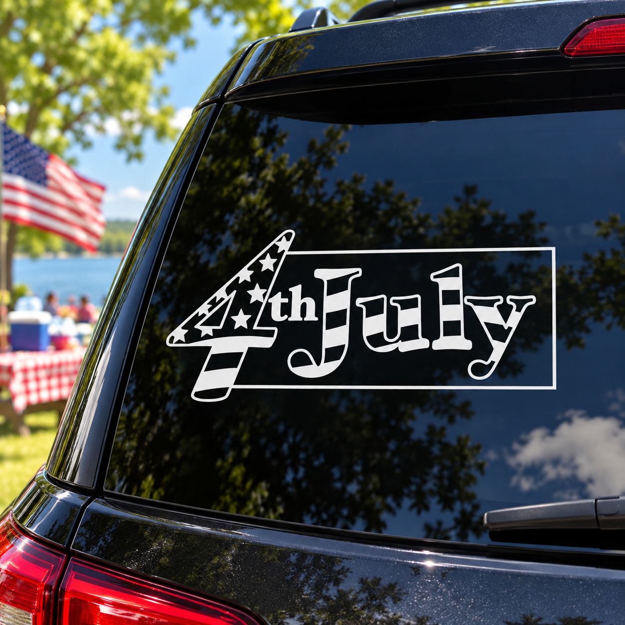 Car window wrapped text decal reading "the July" with fireworks and stars