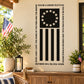 Patriotic flag decal with circular stars, vertical stripes, and bold surrounding text
