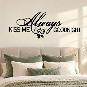 Black script wall decal: "Always Kiss Me Goodnight" with small floral accent