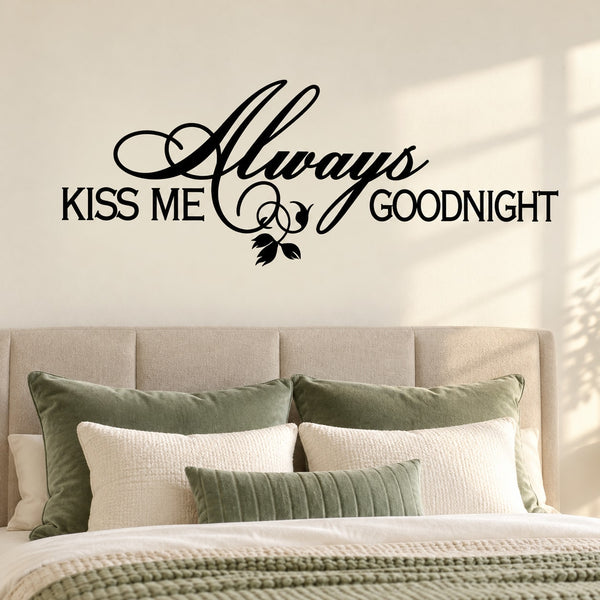 Black script wall decal: "Always Kiss Me Goodnight" with small floral accent