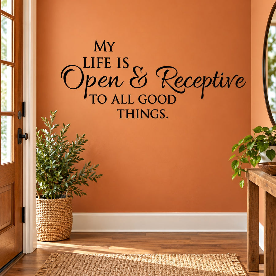 Black wall decal with quote: “My Life Is Open & Receptive To All Good Things.”