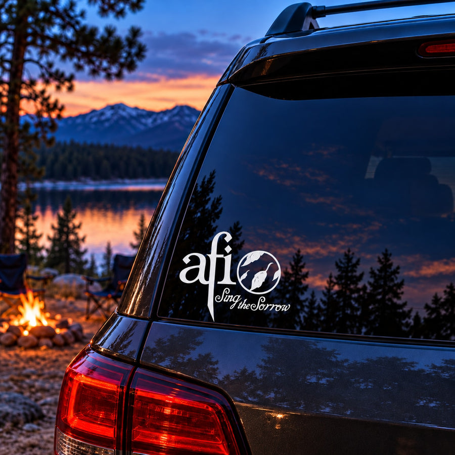 Car rear window decal with white afi logo and “Sing the Sorrow” text