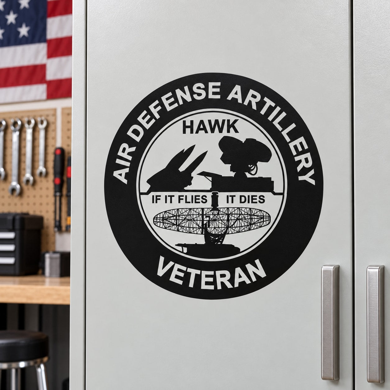 Circular black veteran emblem sticker with white 'AIR DEFENSE ARTILLERY' and hawk logo