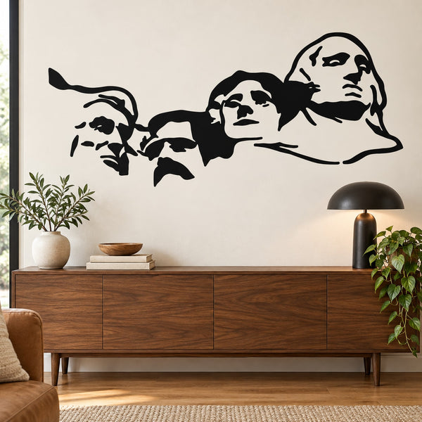 Wall decal featuring four carved faces with bold outlines and profiles