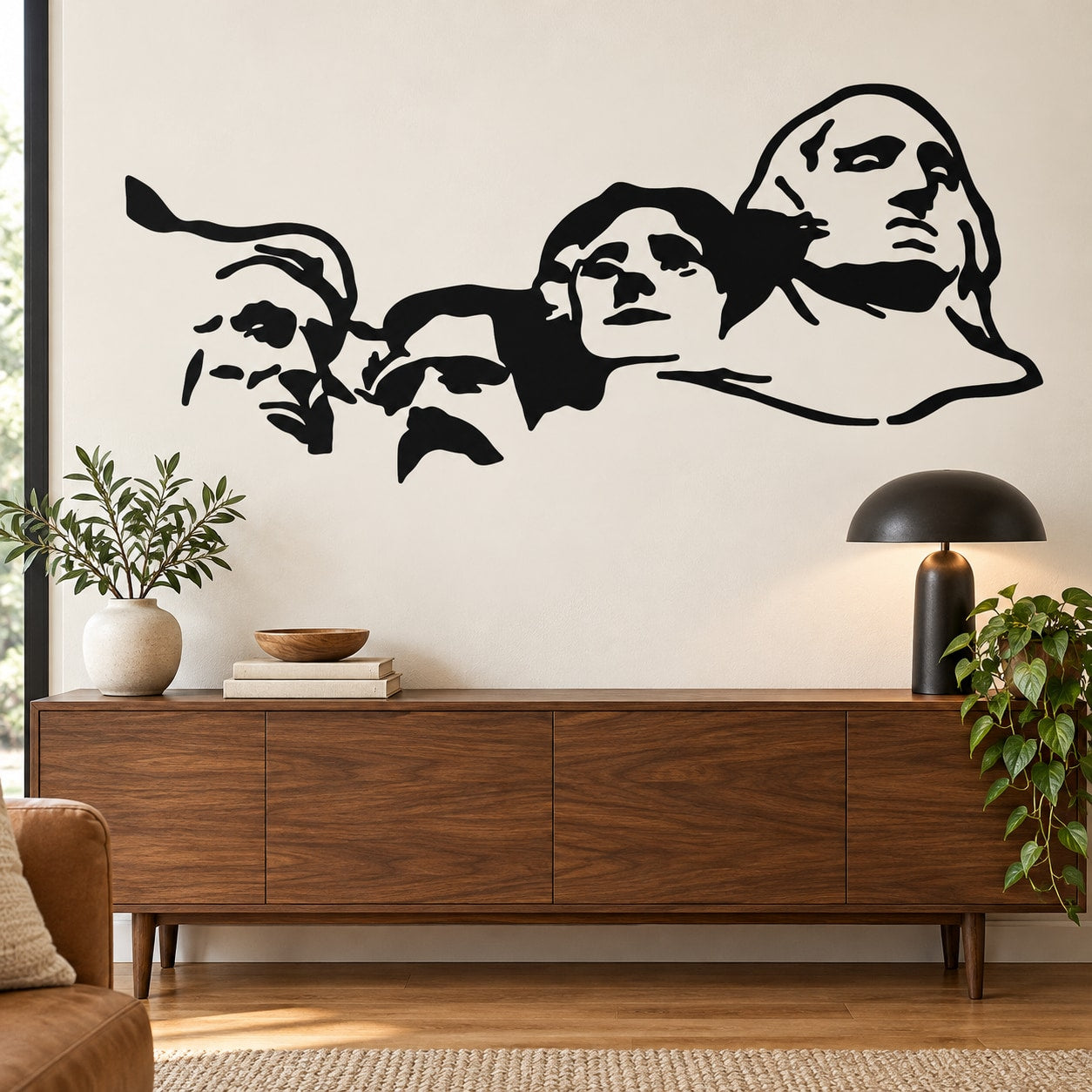 Wall decal featuring four carved faces with bold outlines and profiles