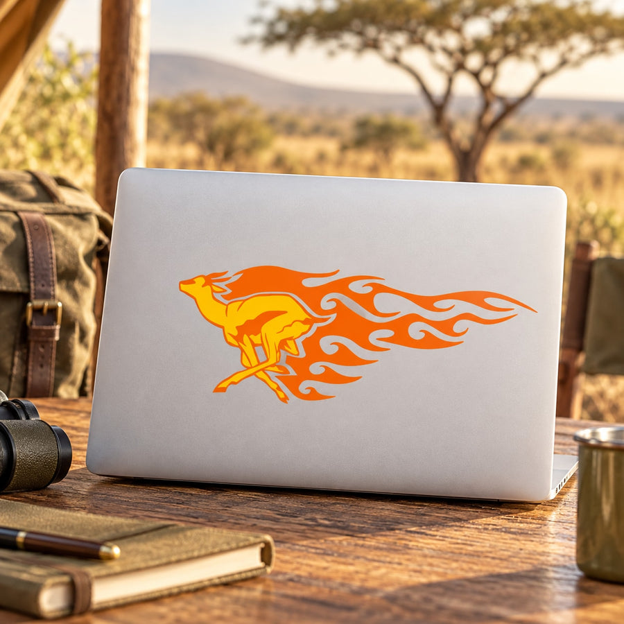 Orange antelope flame sticker on a laptop lid