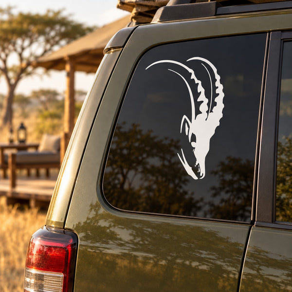 Antelope head decal in white on a car window panel