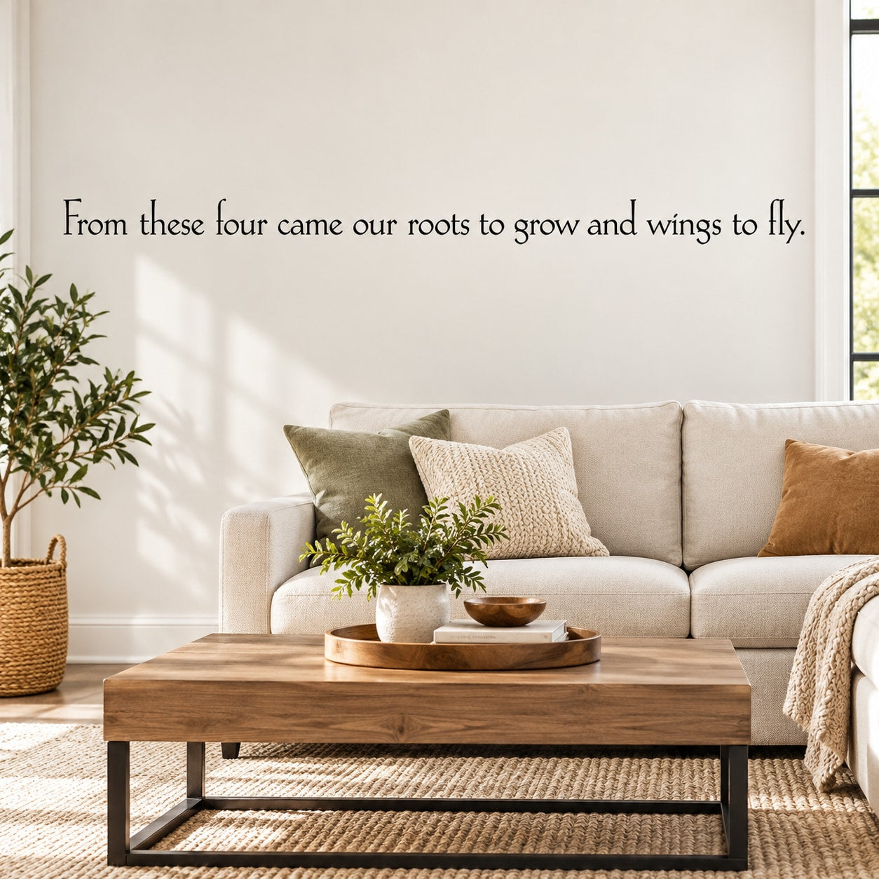 Wall decal quote: “From these four came our roots to grow and wings to fly.”
