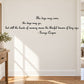 Wall decal with centered quote text in black script, signed George Cooper.