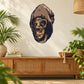 Calm Ape sticker showing an ape face in tan, black, and gold line art.