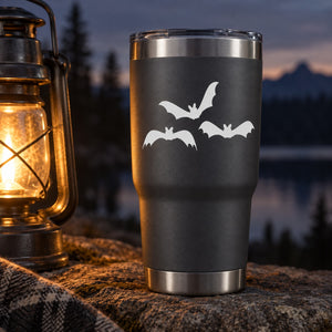 Black tumbler with trio bat decal silhouette, silver rim and base