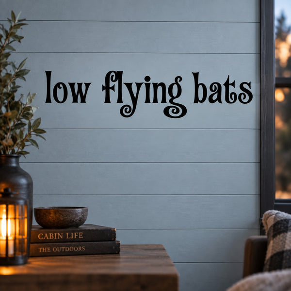 Black "Low Flying bats" quote wall decal