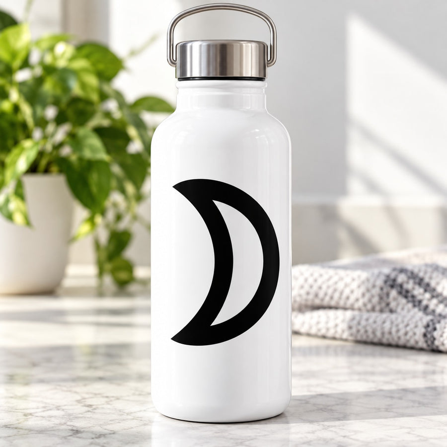 Bold black crescent moon decal with thick curved lines on a white bottle