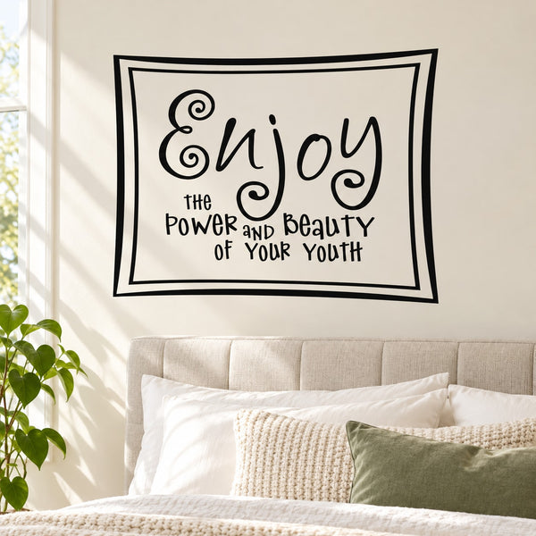 Wall decal typography in black frame: “Enjoy the Power and Beauty of Your Youth”