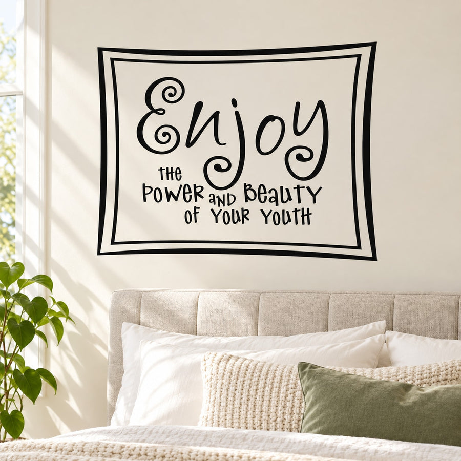 Wall decal typography in black frame: “Enjoy the Power and Beauty of Your Youth”