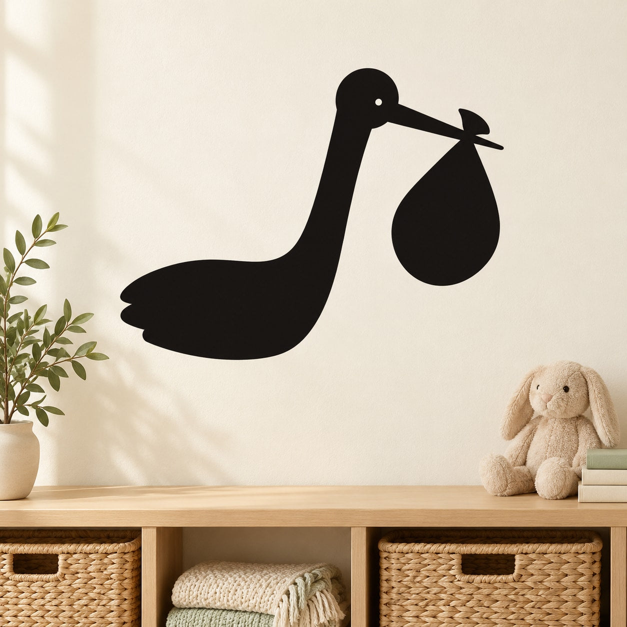 Black stork delivering baby wall decal, stork holding a bundled sack in beak