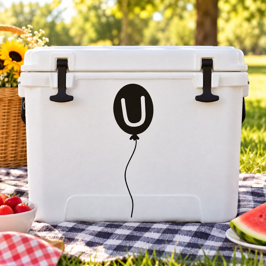Letter U balloon decal on white rectangular cooler-style box