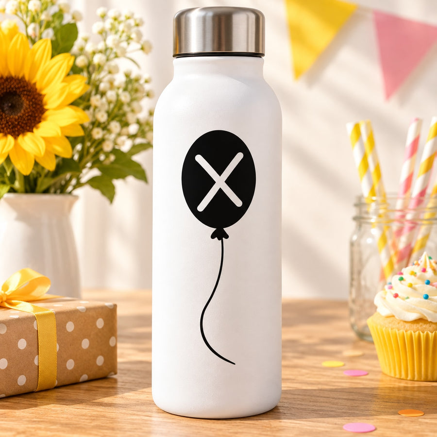 Black balloon decal with white X and curved string, for bottle or wall decor
