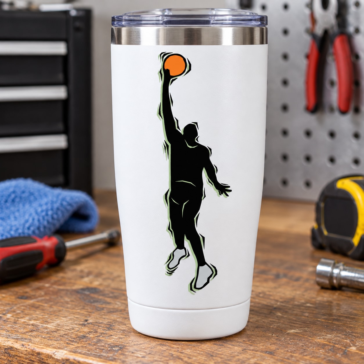Basketball player vinyl decal sticker, die-cut silhouette on white tumbler