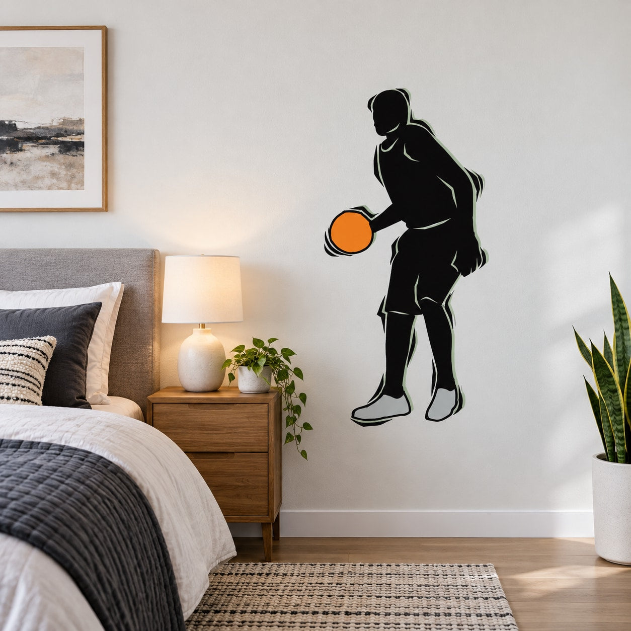Black basketball player wall decal silhouette holding an orange basketball