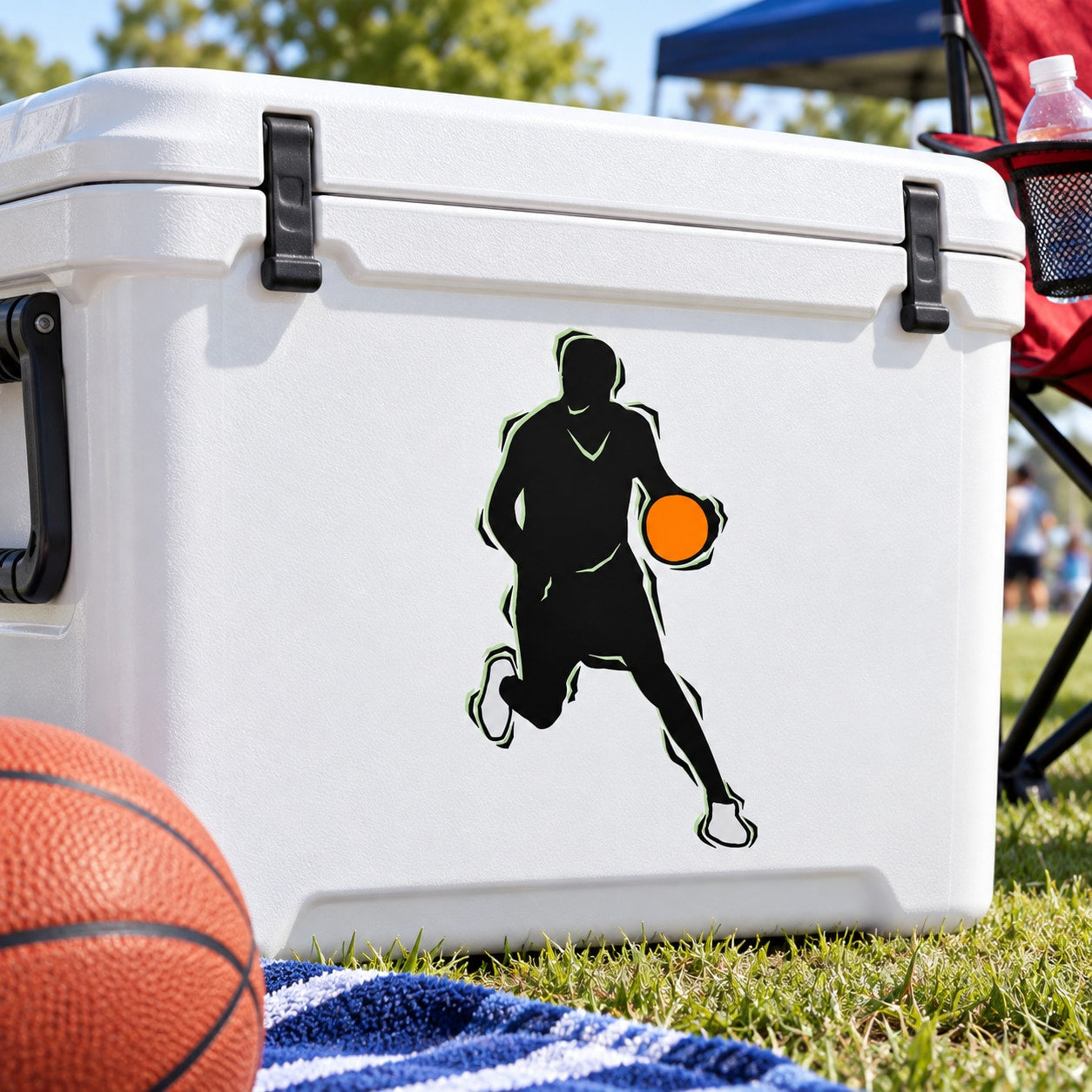Basketball player silhouette vinyl decal holding an orange basketball