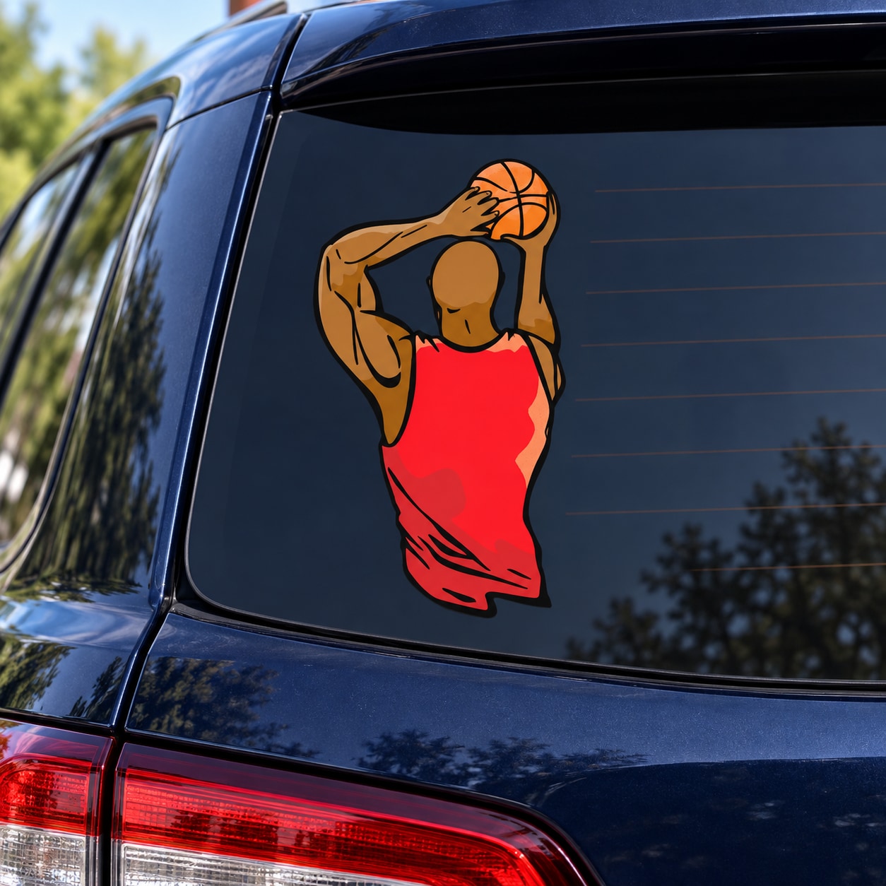 Basketball player vinyl die-cut decal with orange ball and red silhouette