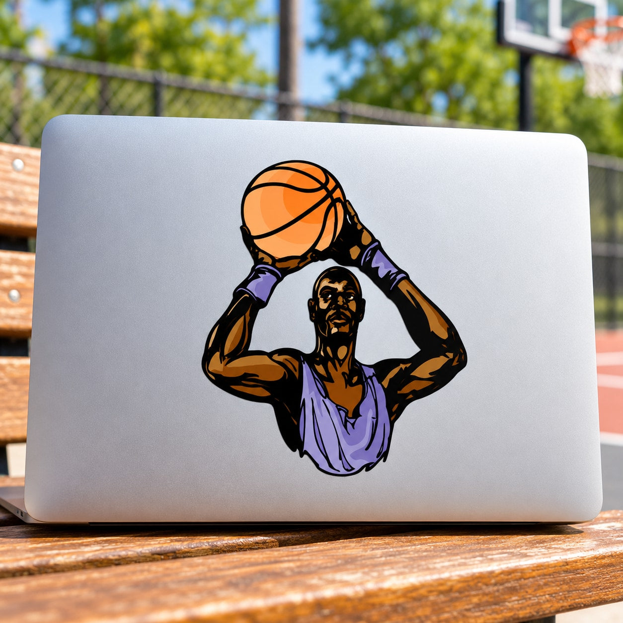 Die-cut basketball vinyl sticker showing a player with a black dog face holding a ball