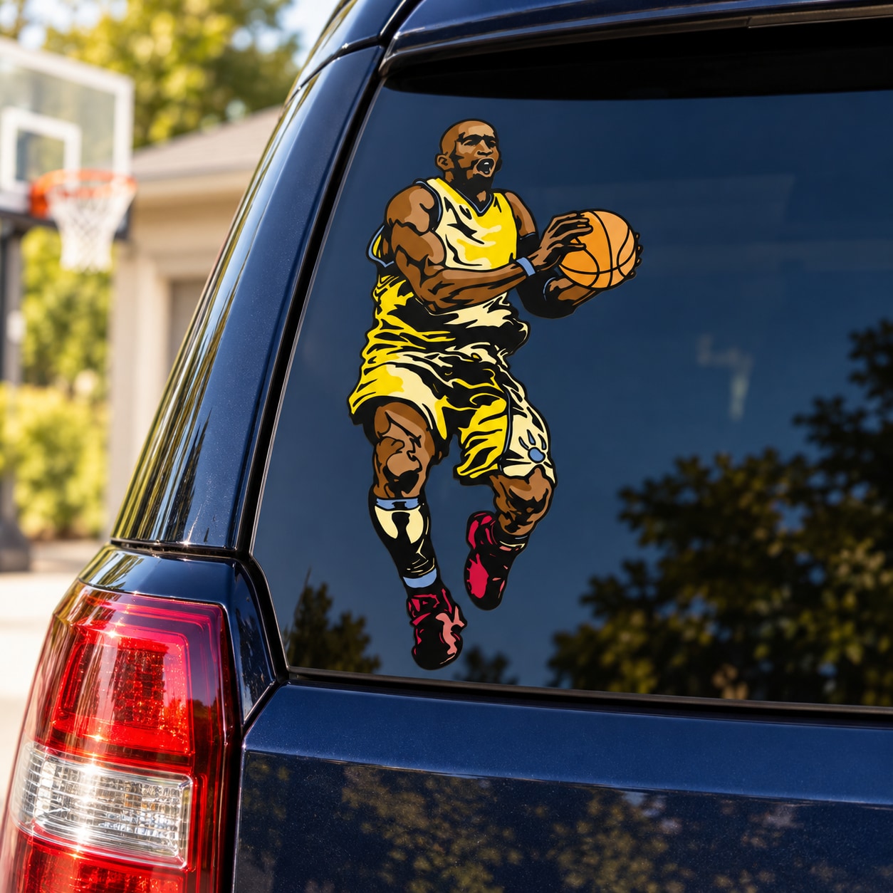 Basketball player vinyl decal sticker with yellow uniform holding a basketball, die-cut