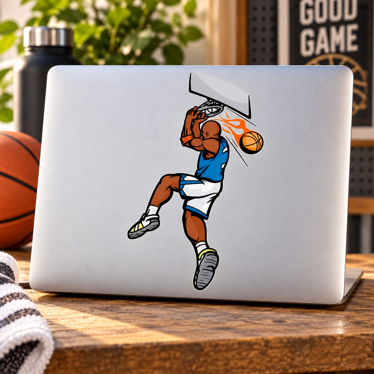 Cartoon basketball player vinyl decal sticker with orange ball, blue jersey, on white background