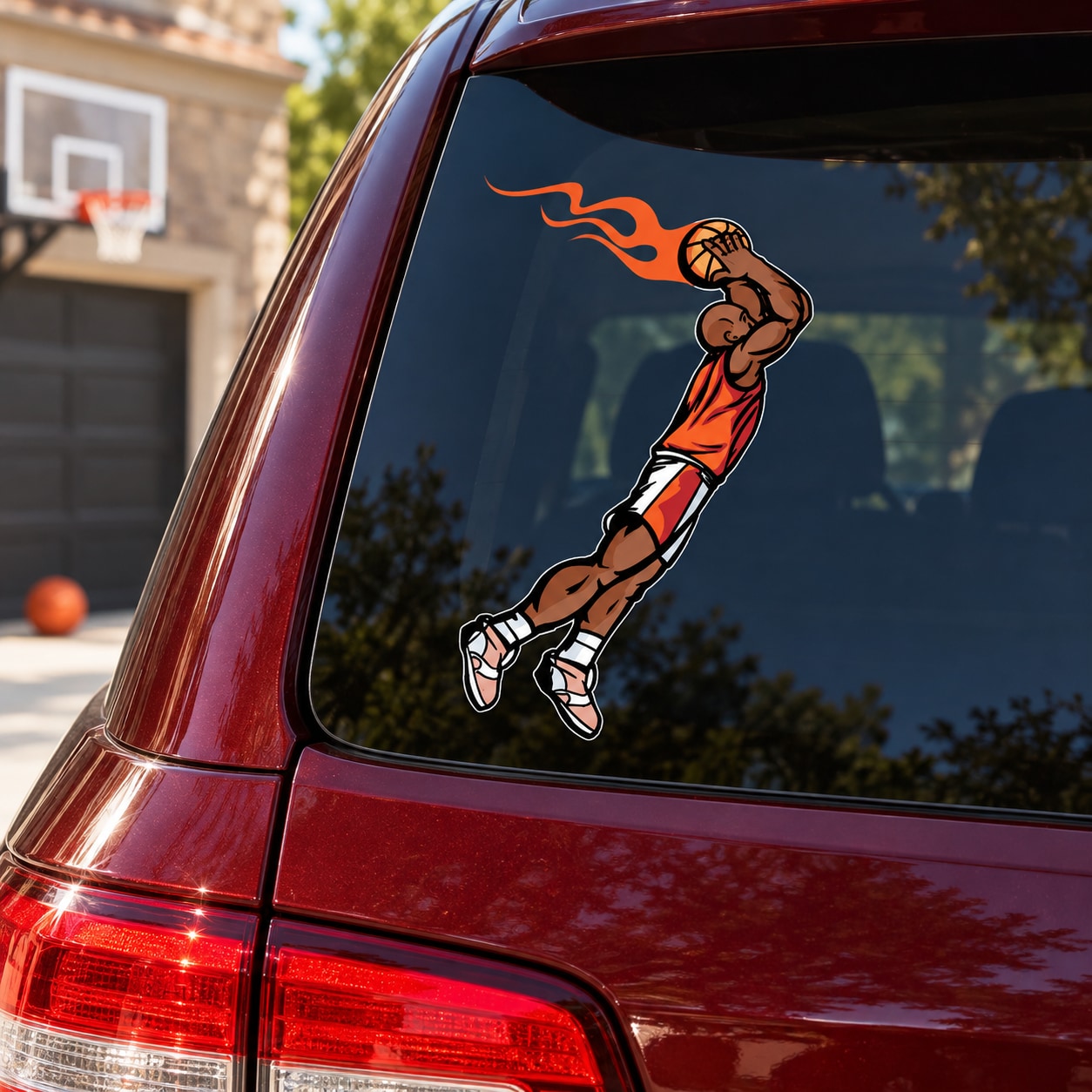 Basketball player vinyl decal sticker with orange flames, on car window